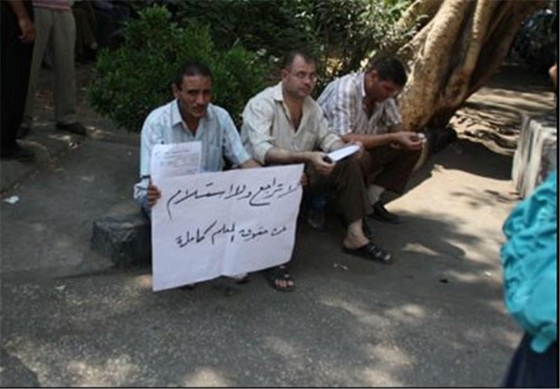 تظاهرات معلمان در مصر در اعتراض به وضع نابرابر قراردادهای تظاهرات معلمان در مصر در اعتراض به وضع نابرابر قراردادهای کاری